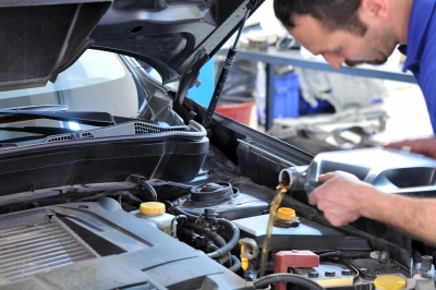 Adding clean oil to car