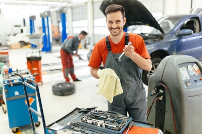 Mechanic smiling